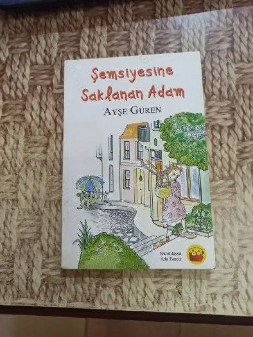 Şemsiyesine Saklanan Adam-Ayşe Güren
