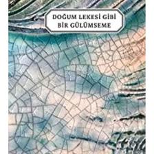 Doğum Lekesi Gibi Bir Gülümseme